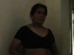 Indian aunty flashes her breasts